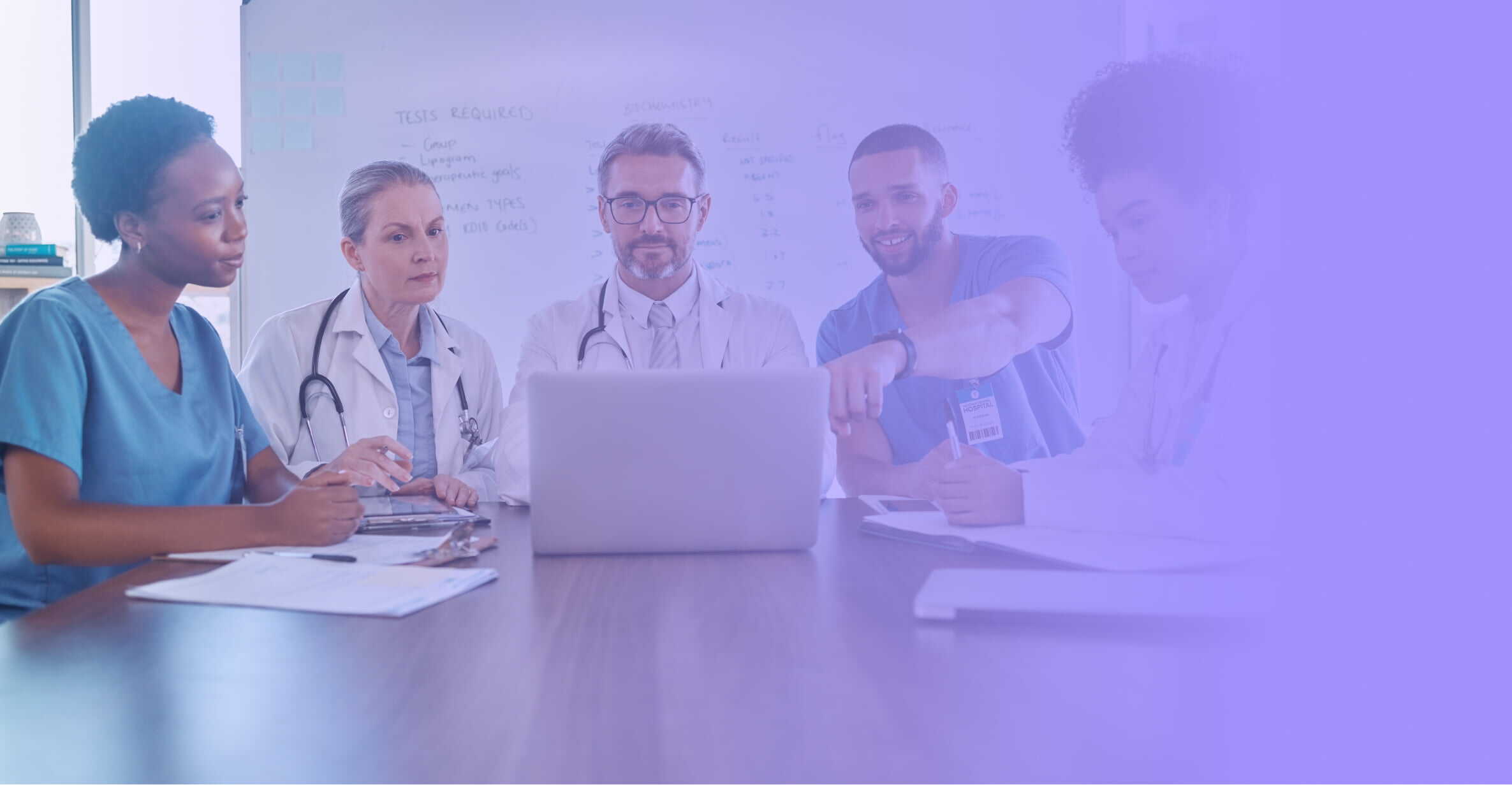 healthcare professionals gathered around a table